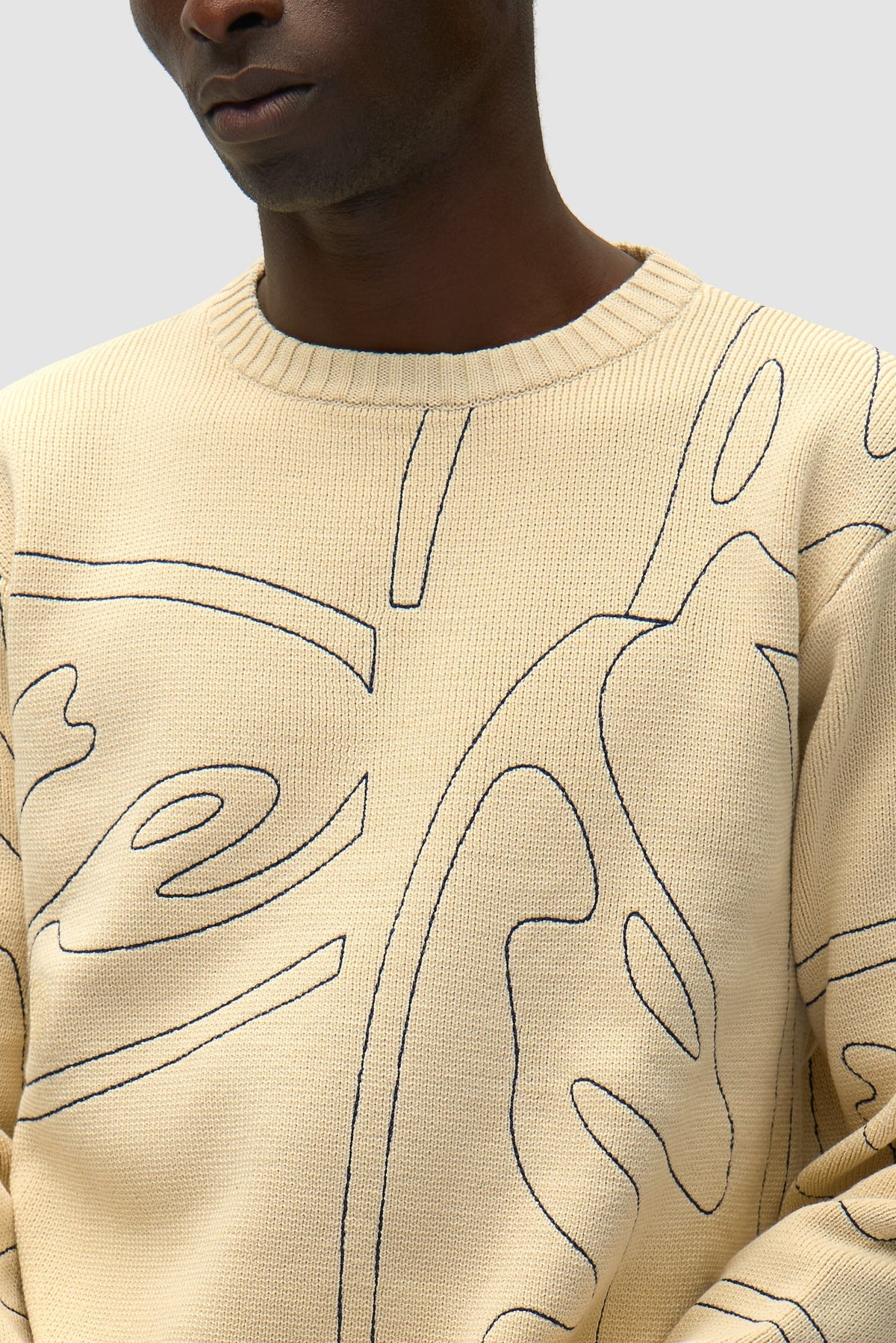 Pull en maille avec logo cercle sur toute la surface - Crème
